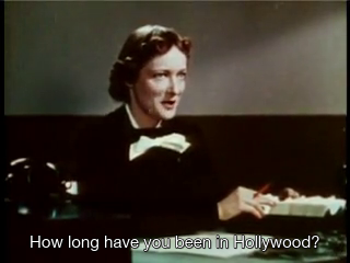 Still from A Star Is Born (1937) in which a woman asks the heroine "How long have you been in Hollywood?"